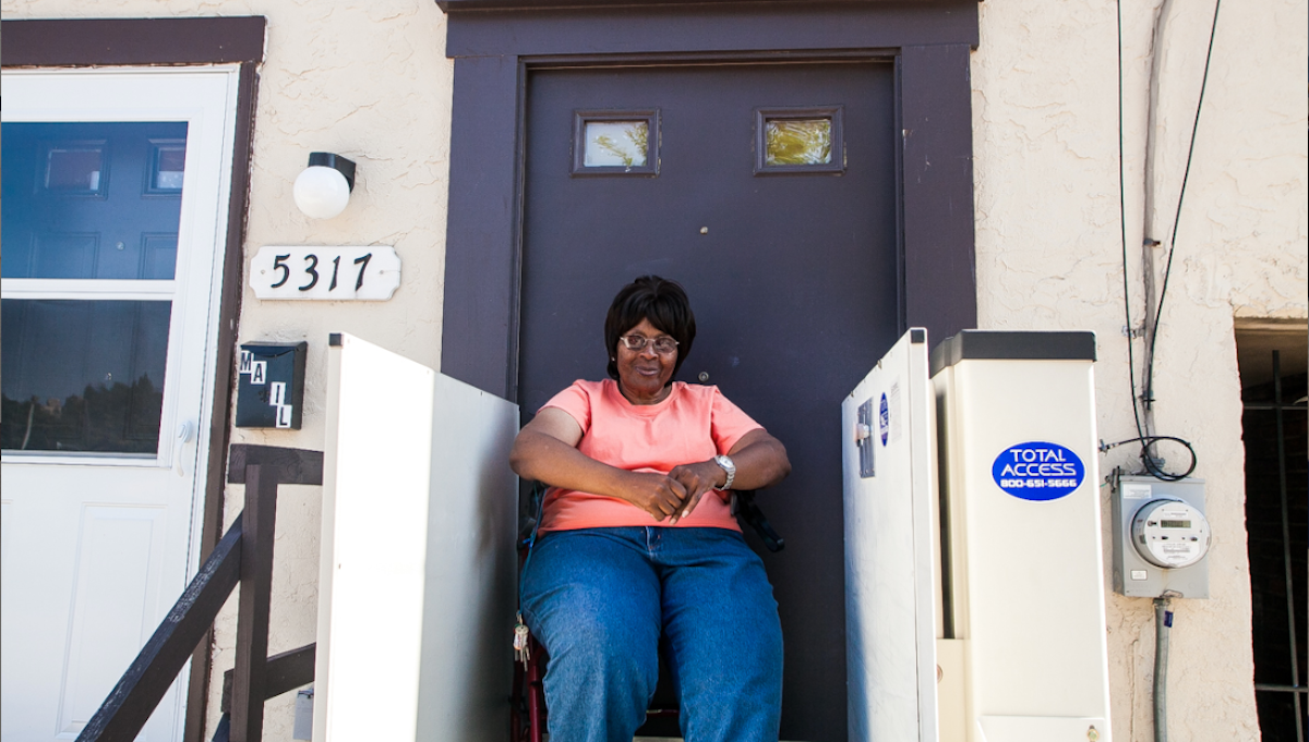 Brenda Jessie lives across the street from the Queen Lane Apartments tower. She says change in the neighborhood is long overdue. (Brad Larrison/for NewsWorks) 