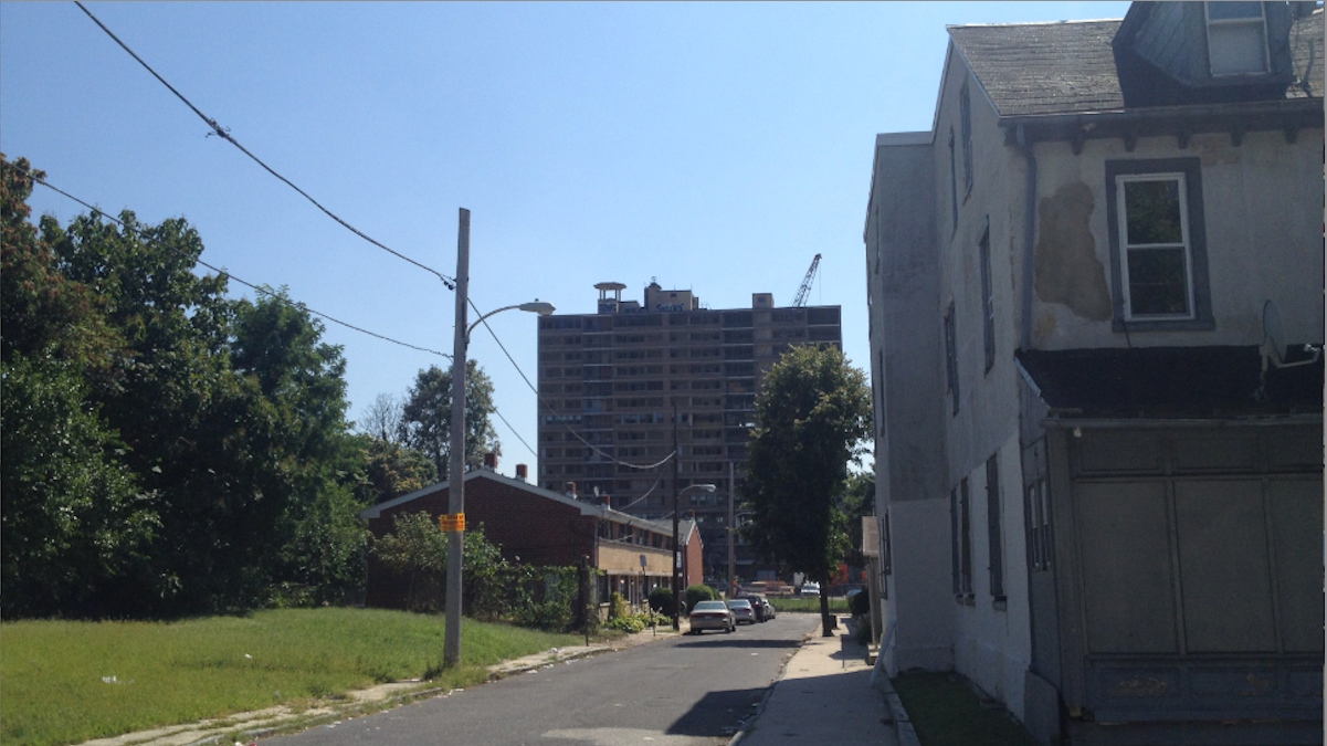  A view of the Queen Lane Apartments tower from W. Coulter St. at Alfred Ave. (Lou Mancinelli/for NewsWorks) 