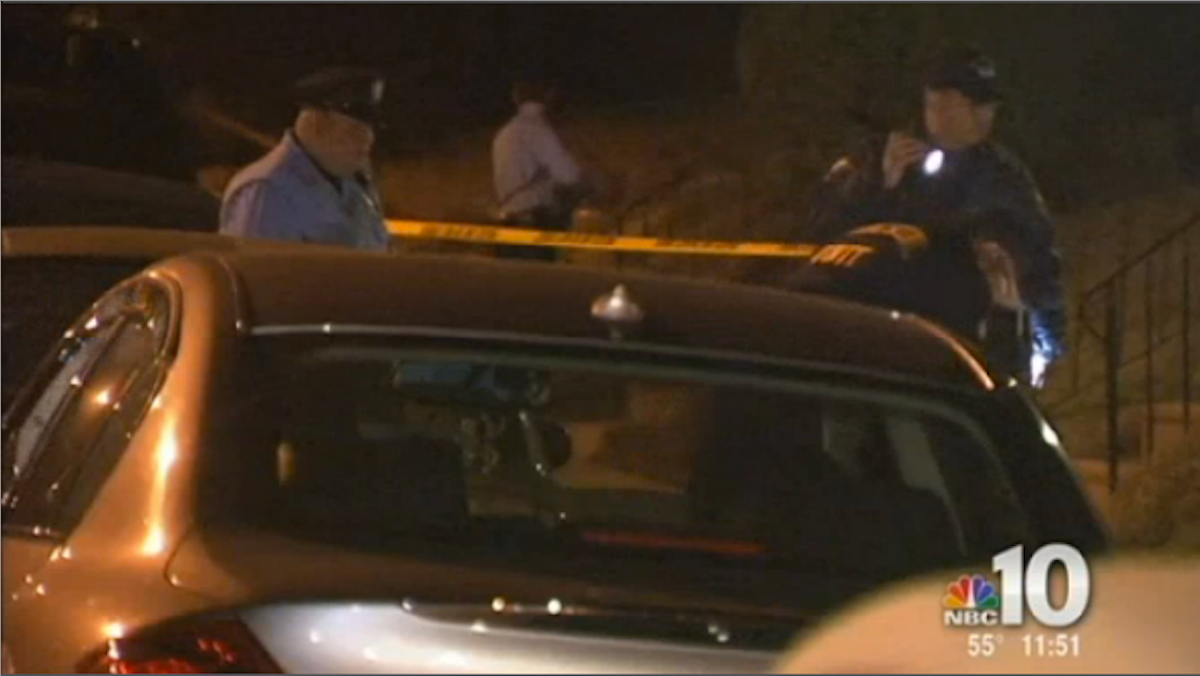  Investigators on the scene of Sunday night's fatal shooting in West Oak Lane. (Photo courtesy of NBC10) 