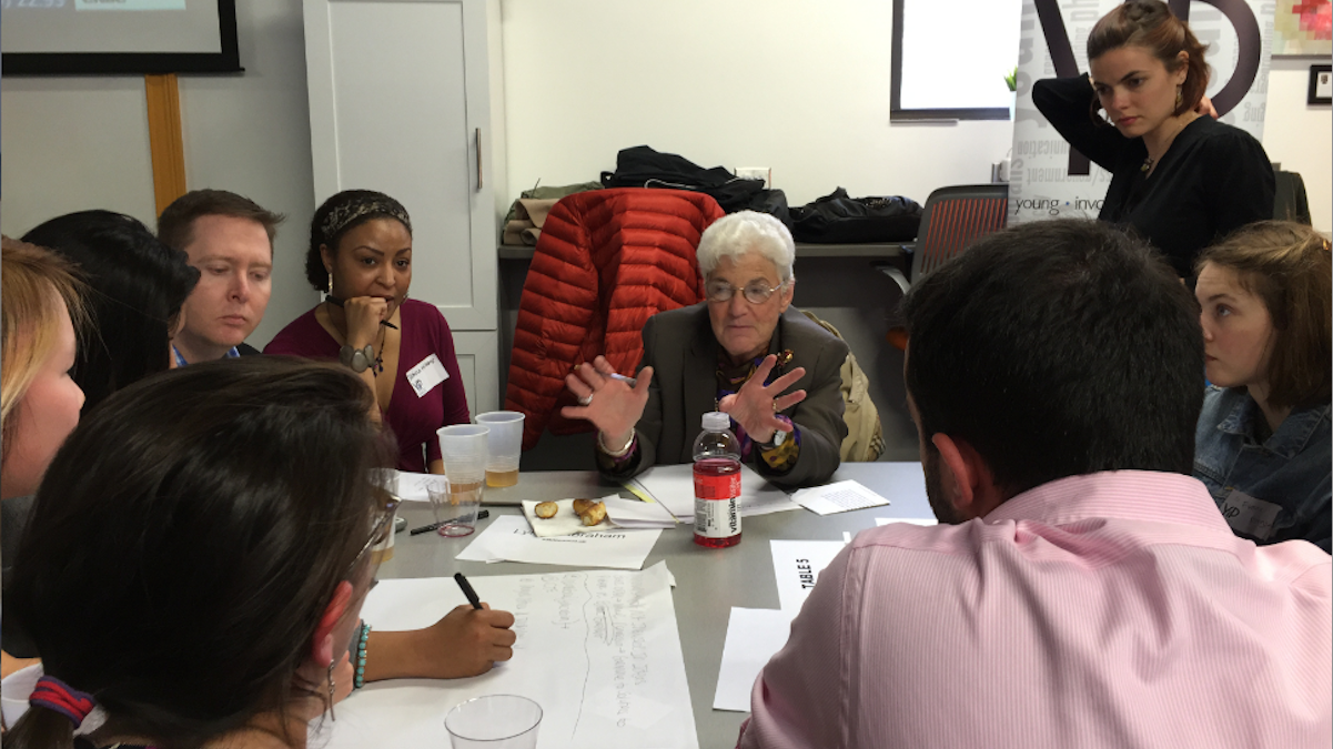  Lynne Abraham and her group at Friday night's 'Mayoral MillenniaLab' event. (Brian Hickey/WHYY) 