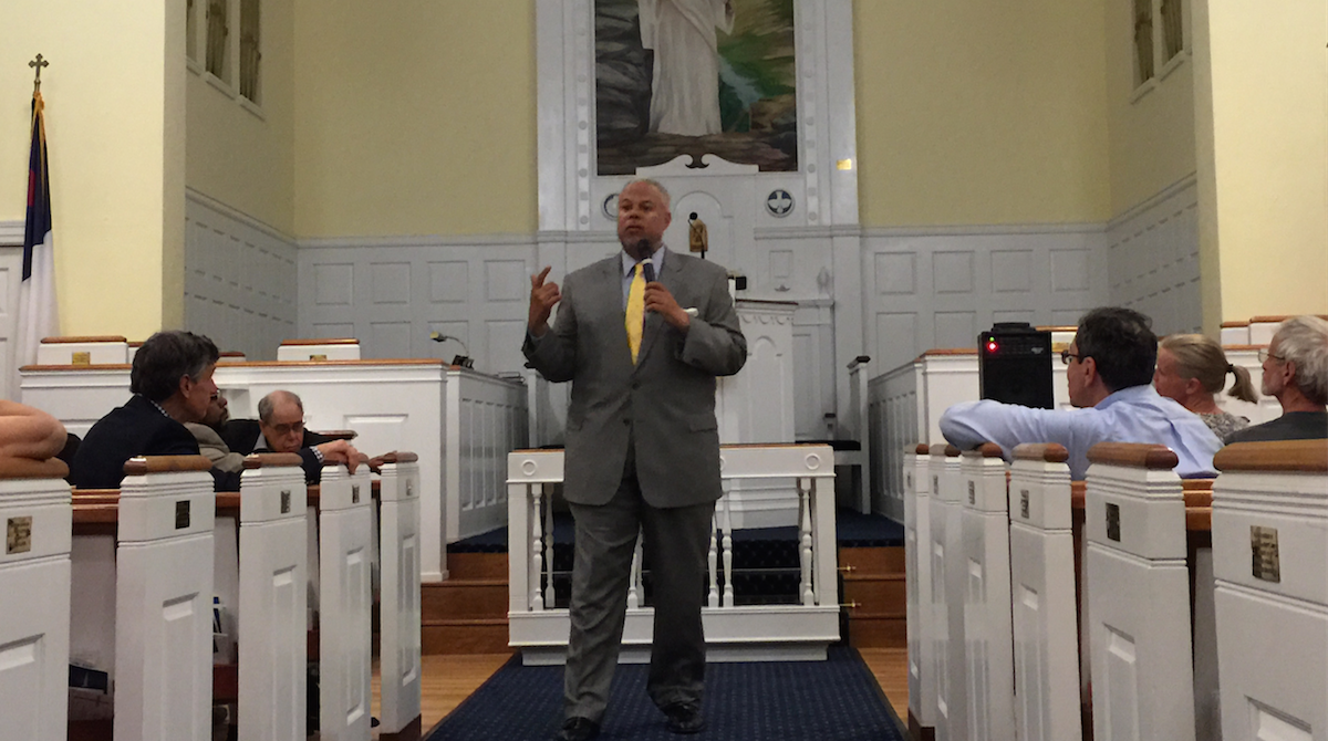  Mayoral candidate Anthony Hardy Williams was the last mayoral candidate of the night to speak to the East Falls Community Council. (Brian Hickey/WHYY) 