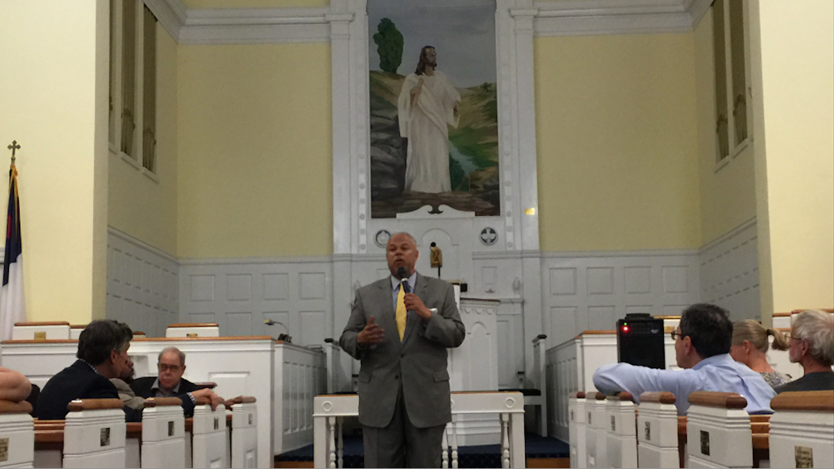  Mayoral candidate Anthony Hardy Williams fields questions during a mayoral forum at East Falls Presbyterian Church on Monday night. (Brian Hickey/WHYY) 