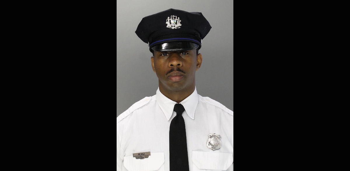  Philadelphia Police Sgt. Rafael Ali was driving on Henry Avenue in Roxborough shortly after 11:30 p.m. Saturday when he lost control of his car at a curve. (Courtesy of Philadelphia Police) 
