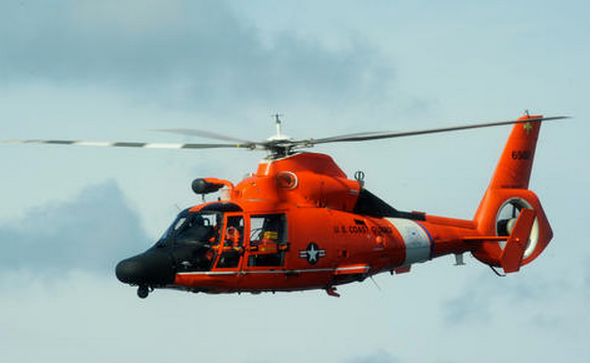  A Coast Guard file photo of a MH-65 Dolphin helicopter, which was used in the search for Renee Lopez, 30, who apparently fell overboard from a commercial fishing boat Wednesday morning. The Coast Guard called off the search Thursday morning. 