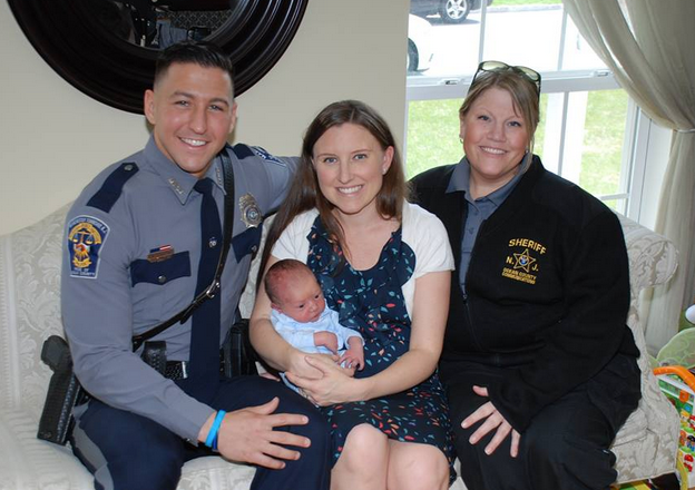  Ofc. Joseph Fastige, Dawn Roach, 31, and her newborn son, Jason O’Jon Roach Jr., and Ocean County Sheriff's Department Telecommunicator Alia Hartman. (Photo courtesy of the Manchester Police Department) 