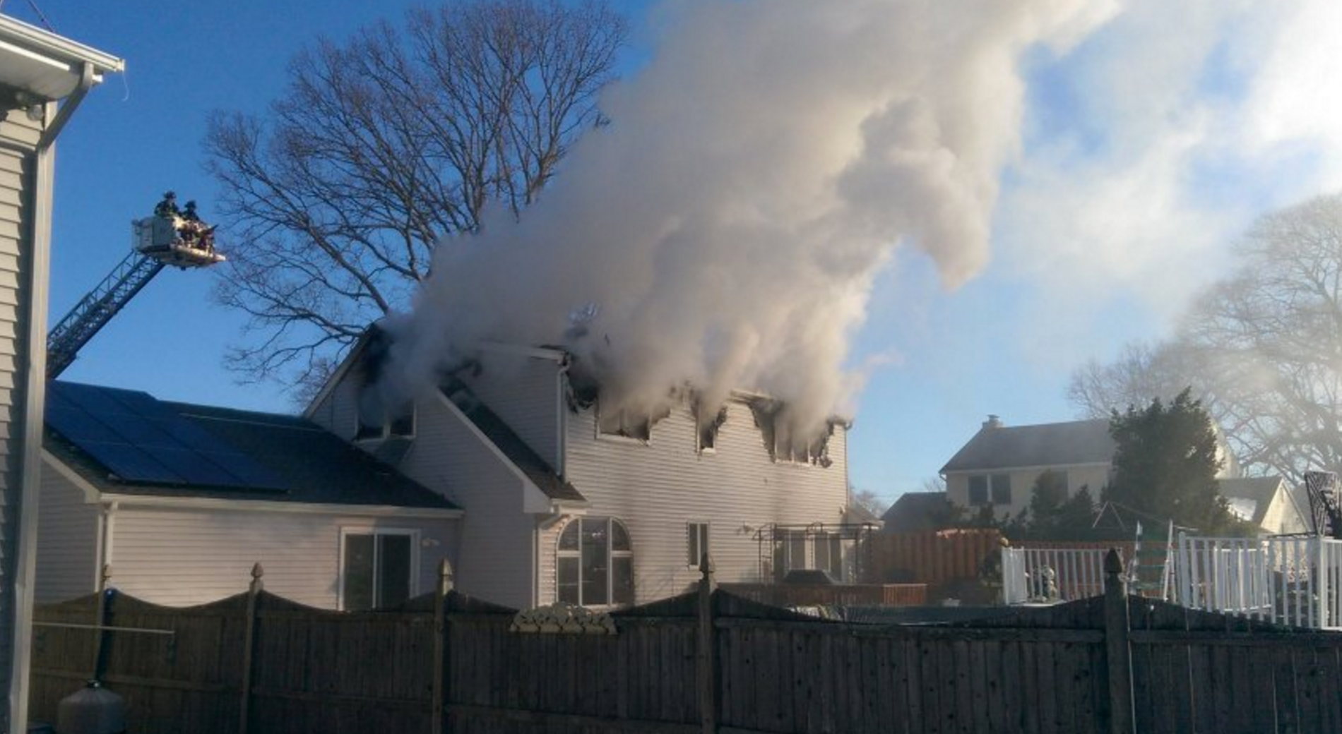  Smoke billowing out of a house on Miller Road in Point Pleasant this morning. (Photo courtesy of NJ Fire Incidents - ‏@wt2fd via Twitter) 