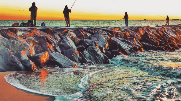 Anglers at sunrise along a jetty in Asbury Park at sunrise today. (Photo: @suzanne_ap via Instagram as tagged #JSHN)