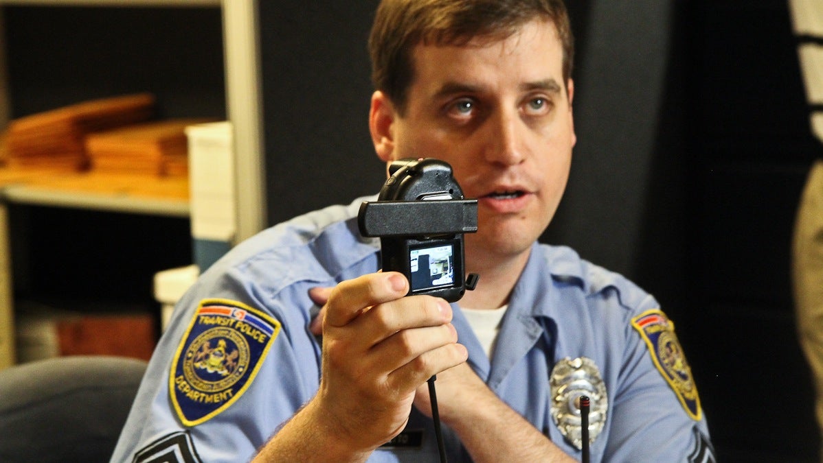  SEPTA Transit Police Sgt. Timothy Catto demonstrates how the new body-mounted camera works. (Kimberly Paynter/WHYY) 