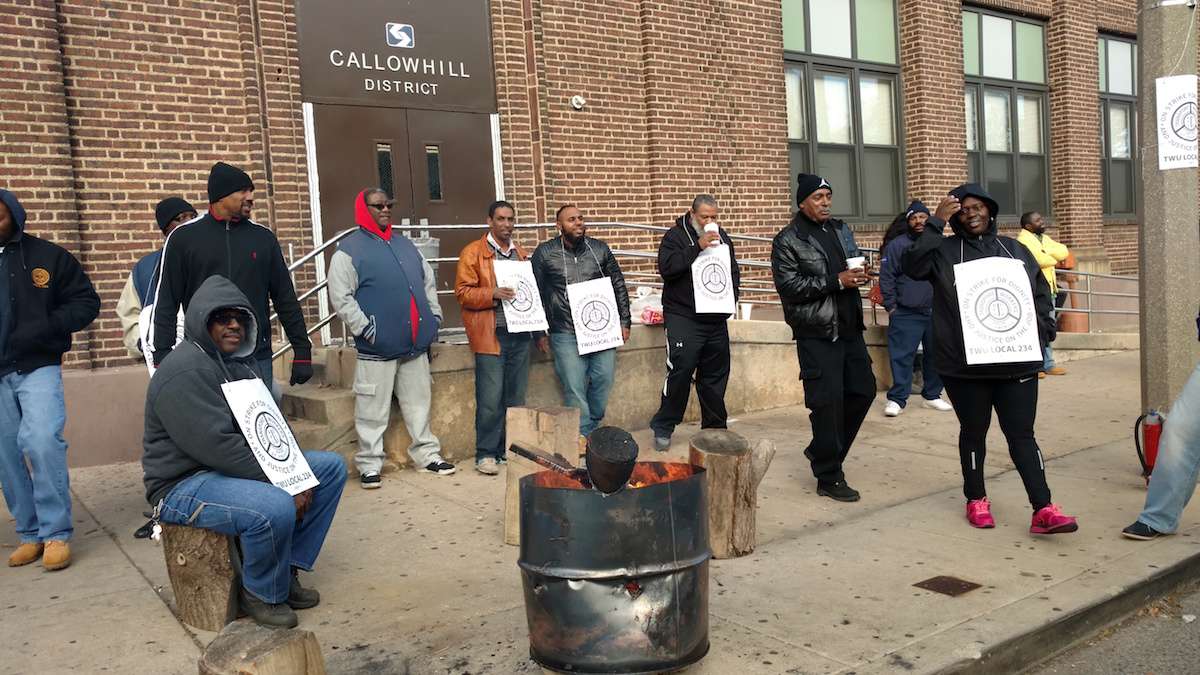 Striking SEPTA mechanics and bus operators picket outside the Callowhill Depot early this month. (Katie Colaneri/WHYY)