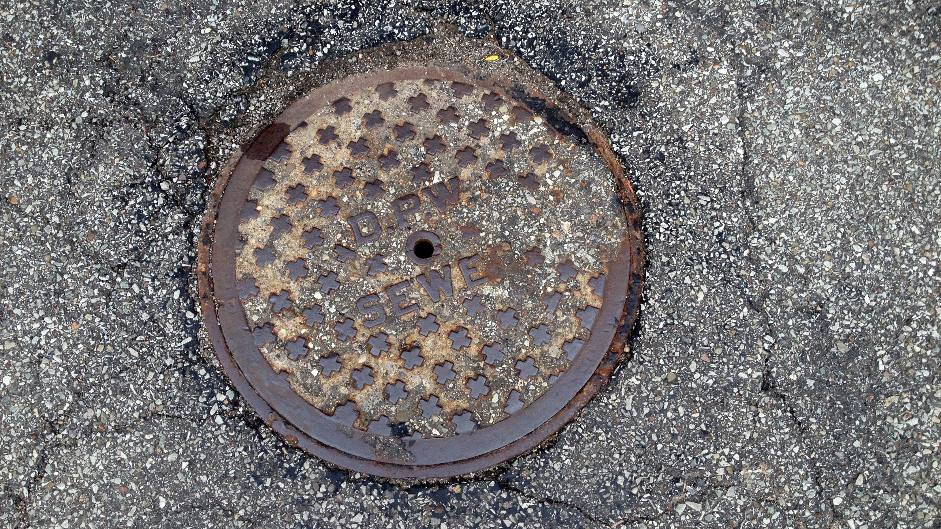 A sewer cover from above.