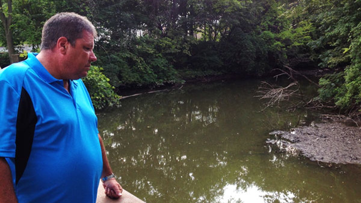 Hillsdale Fire Department Captain Tom Kelley looks out on Pascack Brook