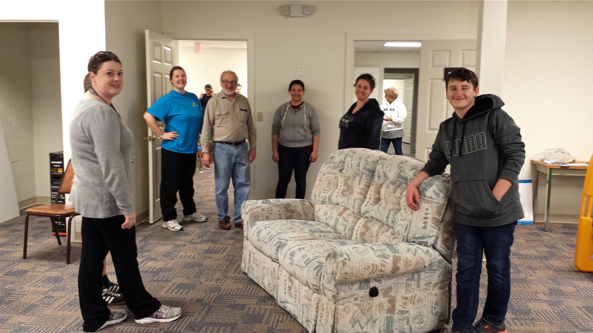 Volunteers move furniture into Family Promise of Lower Bucks' (FPLB) new day center in Tullytown