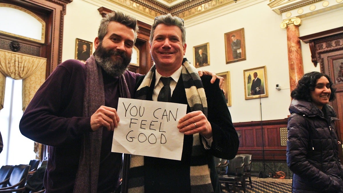  Philadelphia's official Poet Laureate Frank Sherlock and his friend Samuel Durso at City Hall Friday for Sherlock's appointment to the position. (Kimberly Paynter/WHYY) 