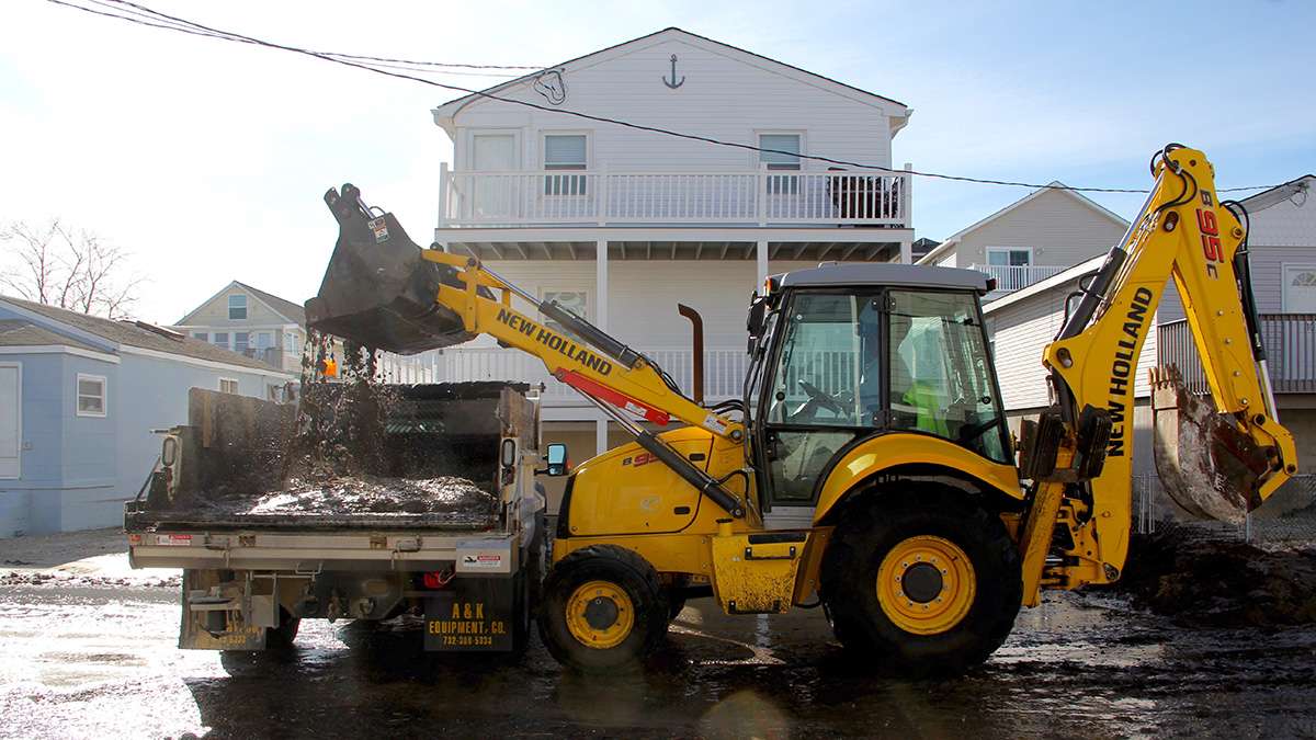 Bay Avenue in West Wildwood is cleared of mud and debris left by flooding from the back bay. (Emma Lee/WHYY)