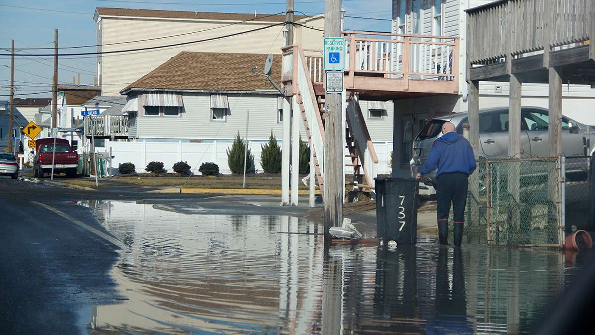  Flood waters linger on the streets of the back bay community of West Wildwood. (Emma Lee/WHYY, file) 