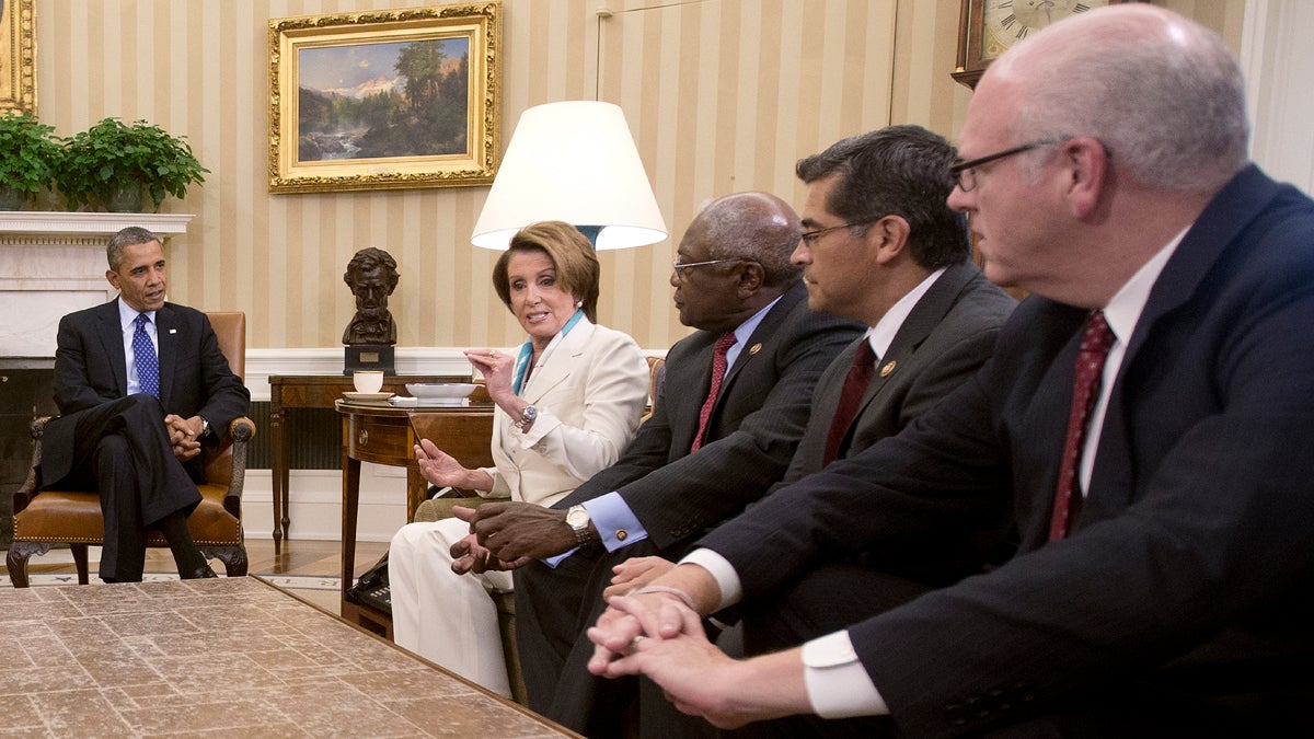  President Barack Obama, far left, is shown meeting with Democratic leadership in the Oval Office of the White House, Tuesday, Oct. 15, 2013. From left: House Minority Leader Nancy Pelosi of Calif., Rep. James Clyburn of S.C., Rep. Xavier Becerra of Calif., Rep. Joseph Crowley of N.Y. (AP Photo/Pablo Martinez Monsivais) 
