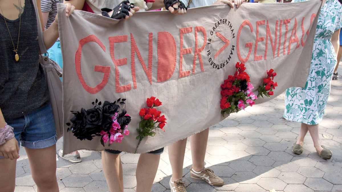 Supporters hold a banner in New York City's Washington Square Park on the 8th Annual Trans Day of Action on June 22