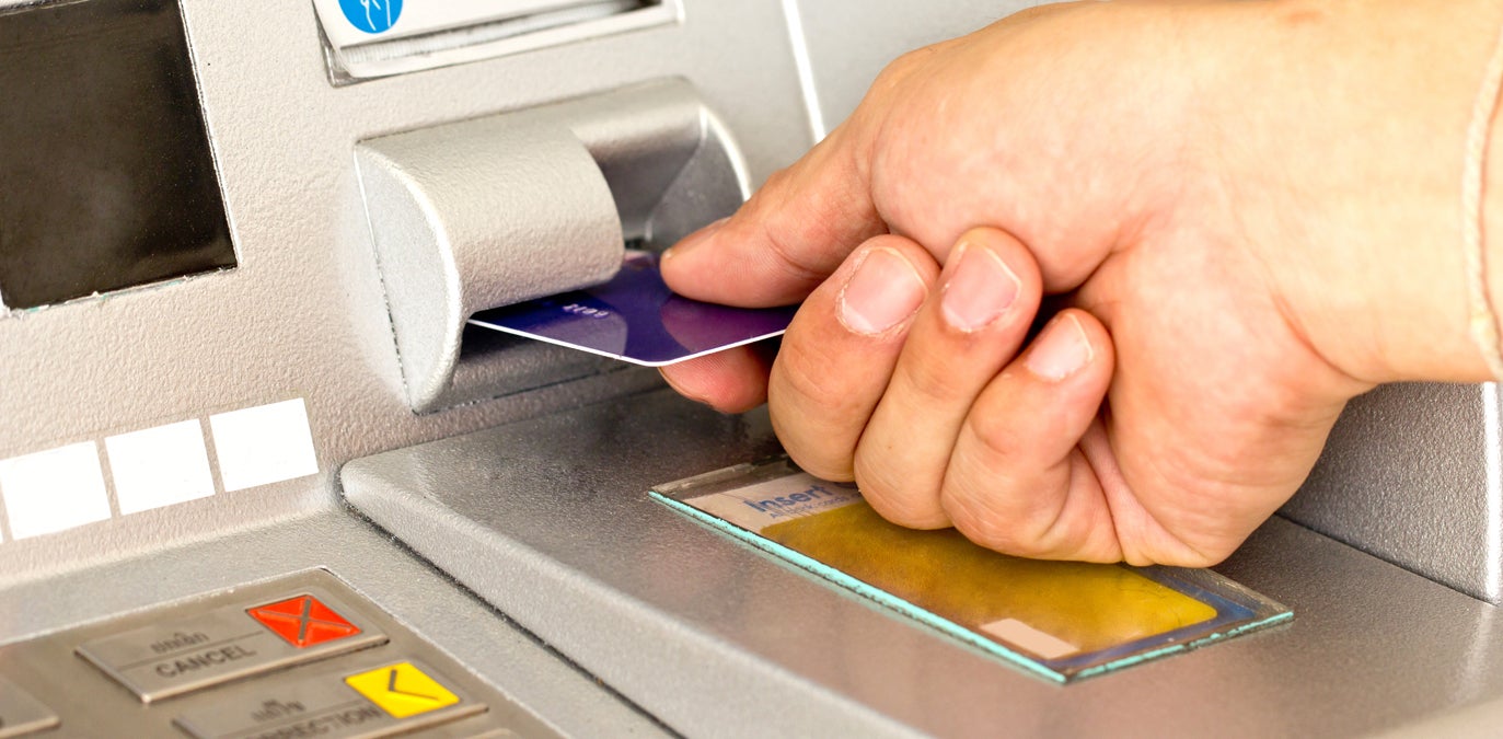  (<a href='http://www.shutterstock.com/pic-134890163/stock-photo-close-up-atm-for-withdraw-your-money.html'>ATM</a> image courtesy of Shutterstock.com) 