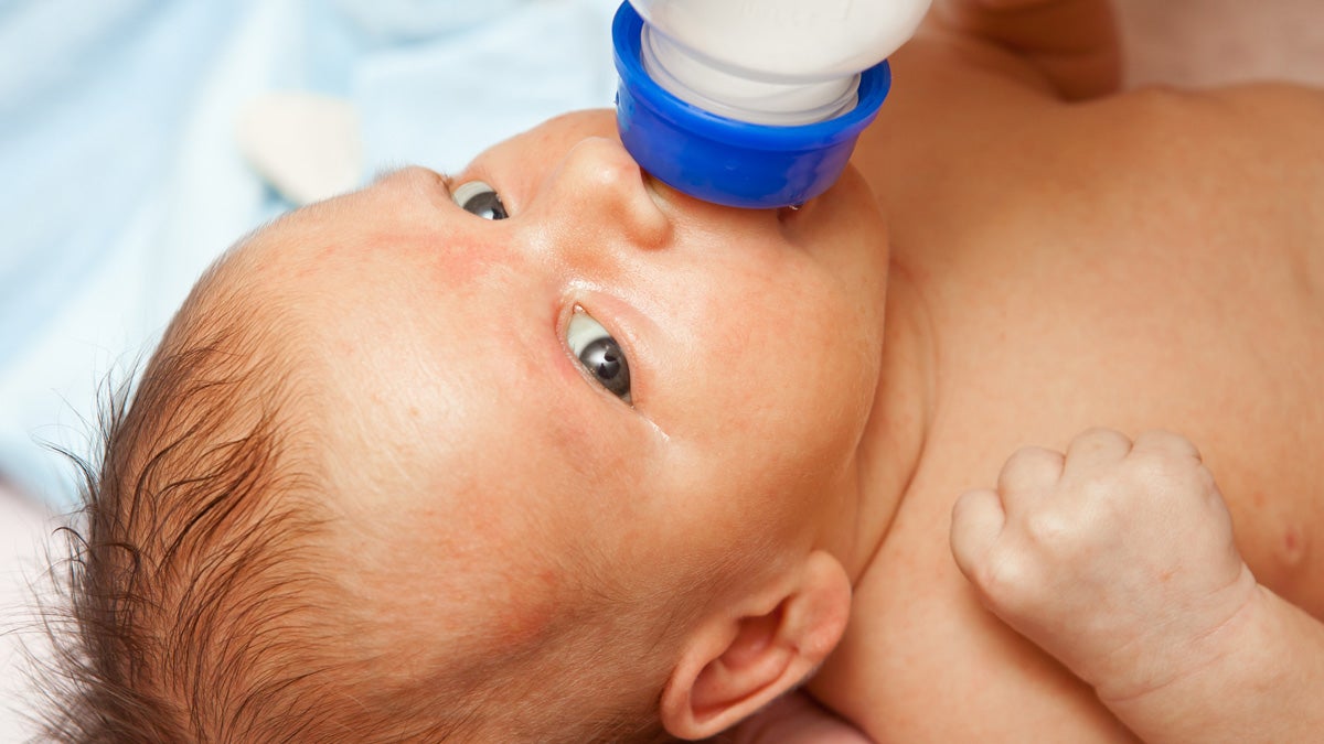  (<a href='http://www.shutterstock.com/pic-208744066/stock-photo-baby-feeding-from-a-bottle-closeup.html'>Bottle feeding</a> image courtesy of Shutterstock.com) 
