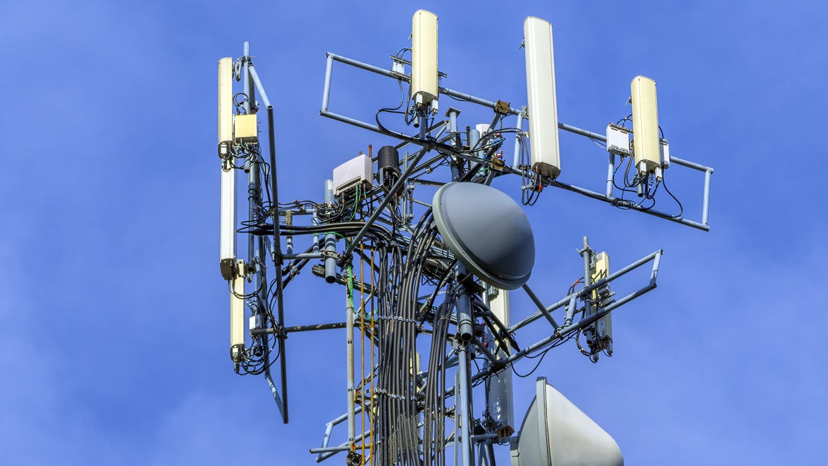  (<a href='http://www.shutterstock.com/pic-122758183/stock-photo-telecommunications-equipment-directional-mobile-phone-antenna-dishes-wireless-communication.html'>Cell tower</a> image courtesy of Shutterstock.com) 