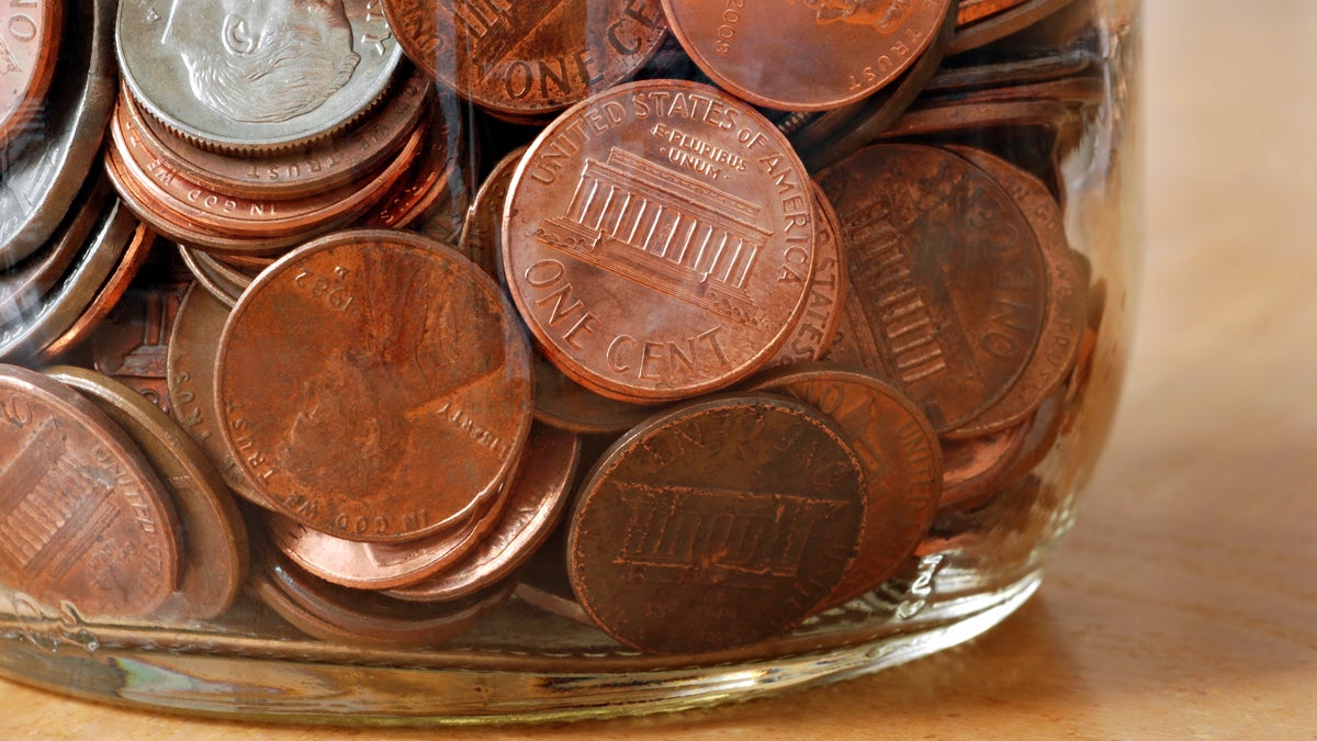  (<a href='http://www.shutterstock.com/pic-16349485/stock-photo-glass-jar-filled-with-american-coins-extreme-closeup-ideal-as-background.html'>Coin jar</a> image courtesy of Shutterstock.com) 