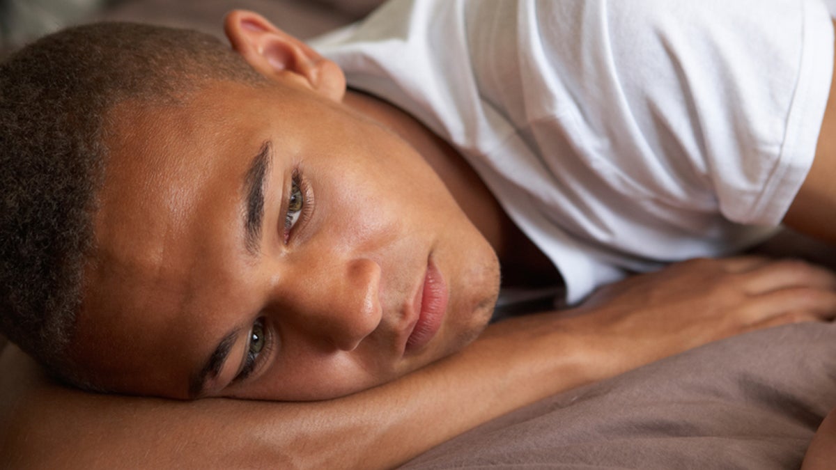  (<a href='http://www.shutterstock.com/pic-71237446.html'>Depressed teenage boy</a> image courtesy of Shutterstock.com) 