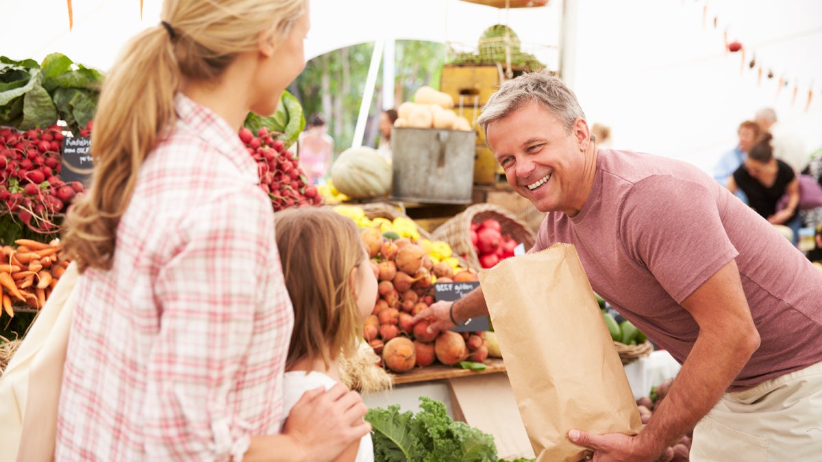  (a href='http://www.shutterstock.com/pic-267549392/stock-photo-family-buying-fresh-vegetables-at-farmers-market-stall.html'>Farmers market image</a> courtesy of Shutterstock.com) 