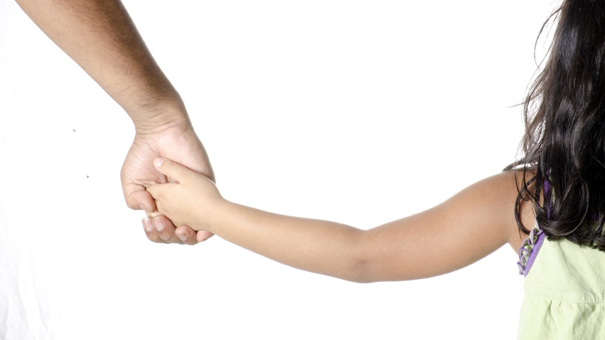  (<a href='http://www.shutterstock.com/pic-201423836/stock-photo-a-little-girl-holding-hands-of-her-daddy.html?src=csl_recent_image-1'>Image</a> courtesy of Shutterstock.com) 