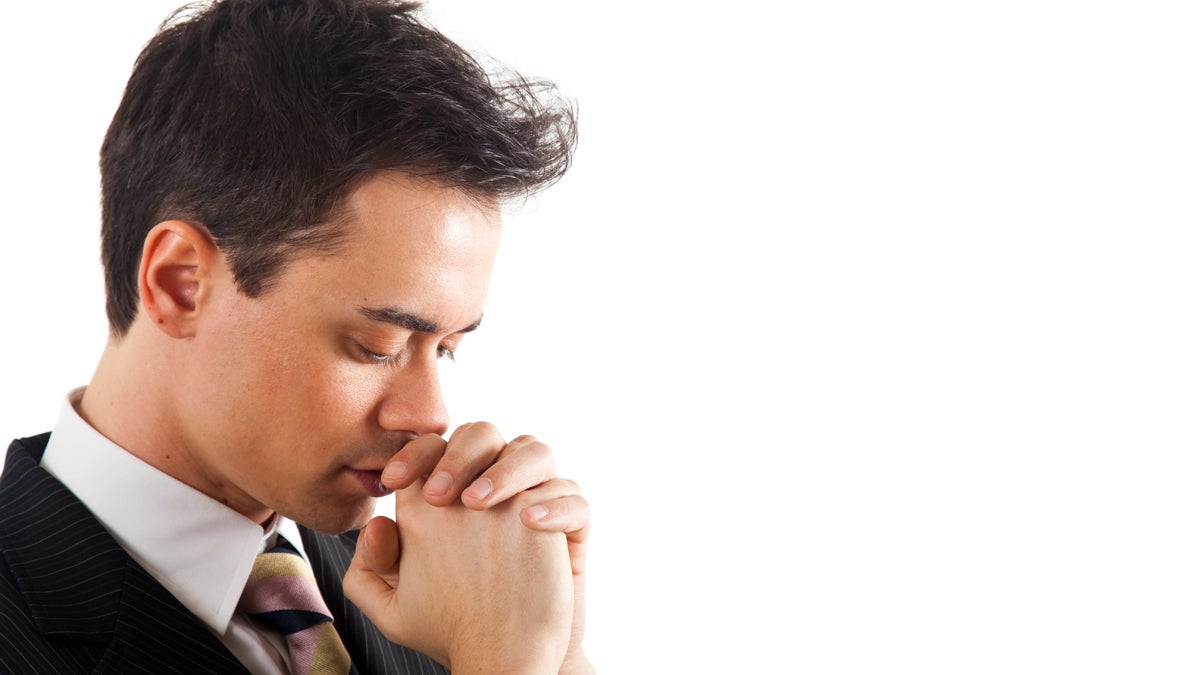  (<a href='http://www.shutterstock.com/pic-81281836/stock-photo-young-businessman-praying-isolated-against-white-background.html'>Businessman praying</a> image courtesy of Shutterstock.com) 