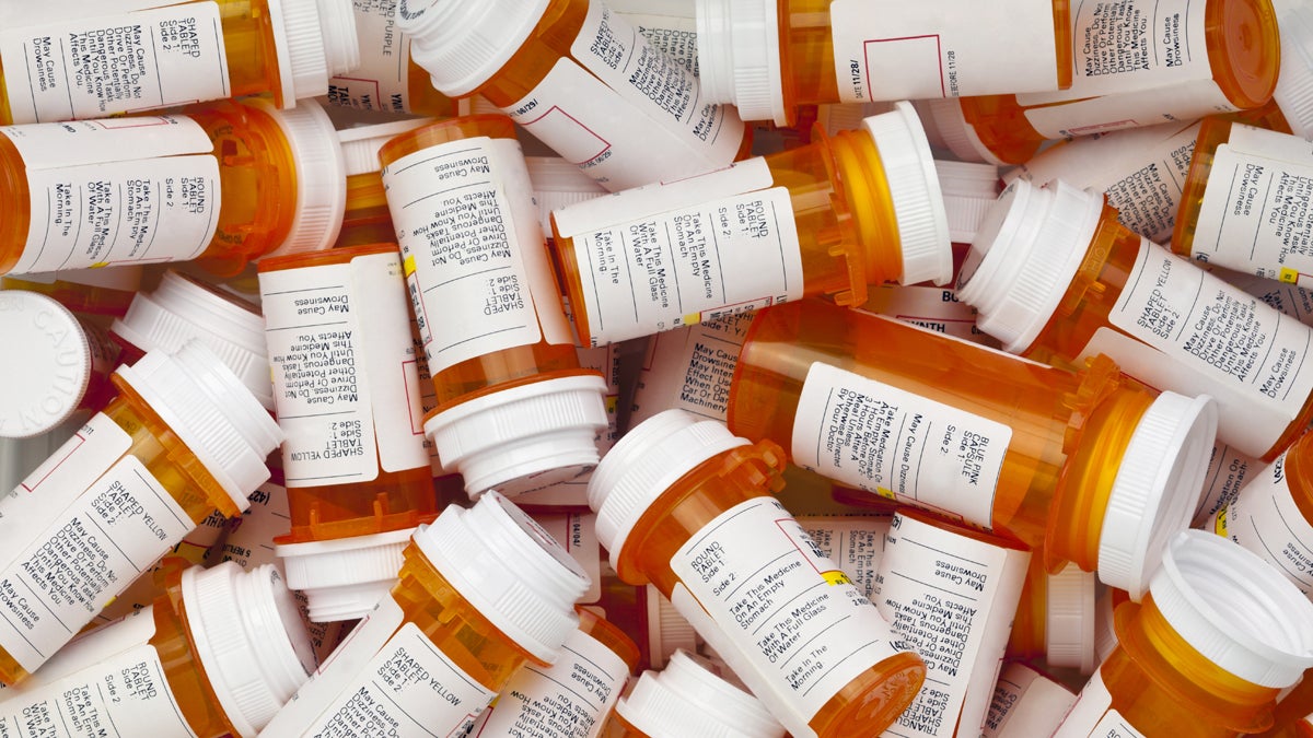 Prescription drug bottles are pictured overhead
