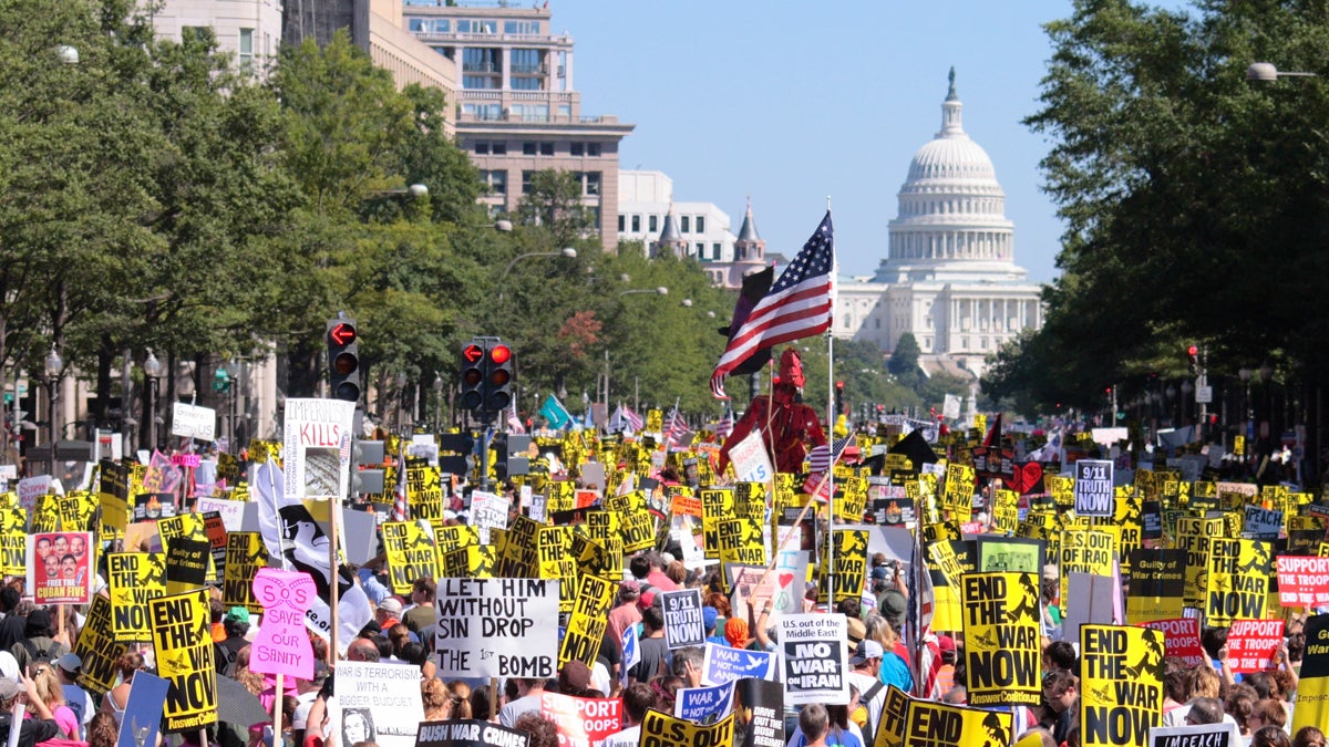  (<a href='http://www.shutterstock.com/pic-97531688/stock-photo-washington-dc-a-mass-of-anti-war-protestors-march-down-pennsylvania-ave-toward-the-capitol.html'>War protest</a> image courtesy of Shutterstock.com) 
