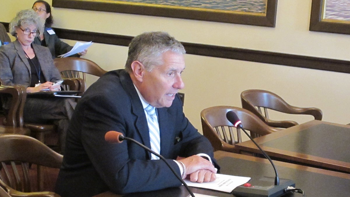  New Jersey Sen. Bob Singer urges the Senate Government Committee to advance his bill allowing school board candidates to appear on the ballot as a slate. (Phil Gregory/WHYY) 