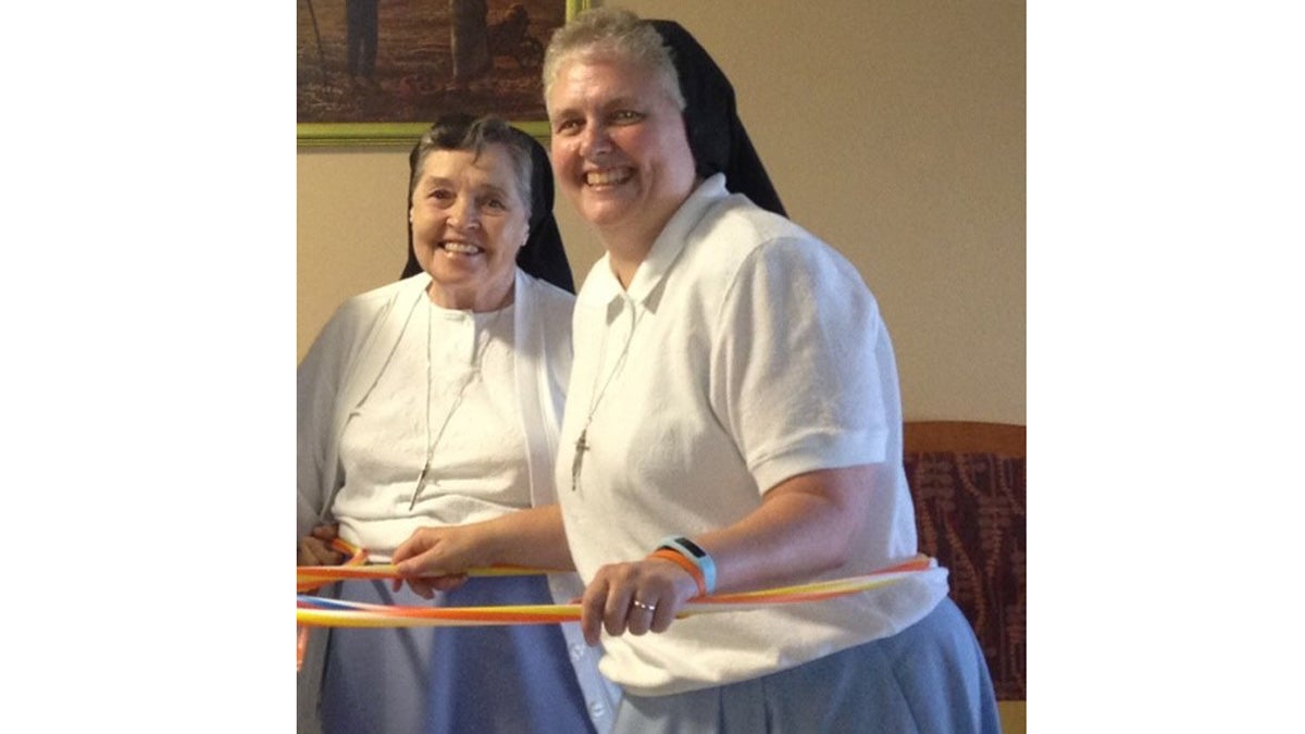  IHM Sisters William Catherine and Sister Mary Grace practice for the Swing with the Sisters Dance Party, which will be part of the World Meeting of Families youth events. (Courtesy of the WMOF) 