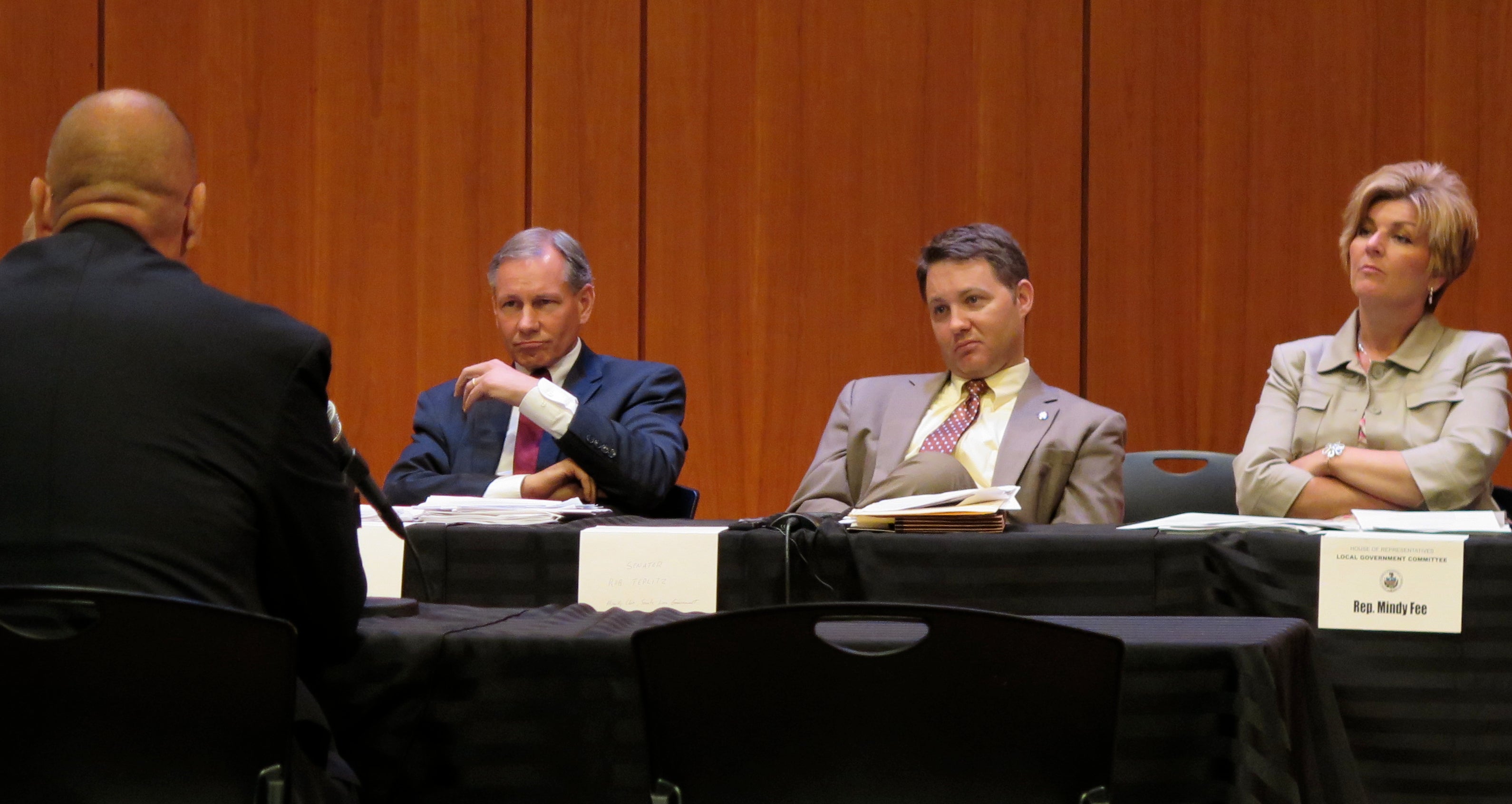  State Sen. John Eichelberger, R-Blair; Sen. Rob Teplitz, D-Dauphin; and Rep. Mindy Fee, R-Manheim; listen to testimony during a joint Local Government Committees hearing. (Emily Previti/WHYY) 