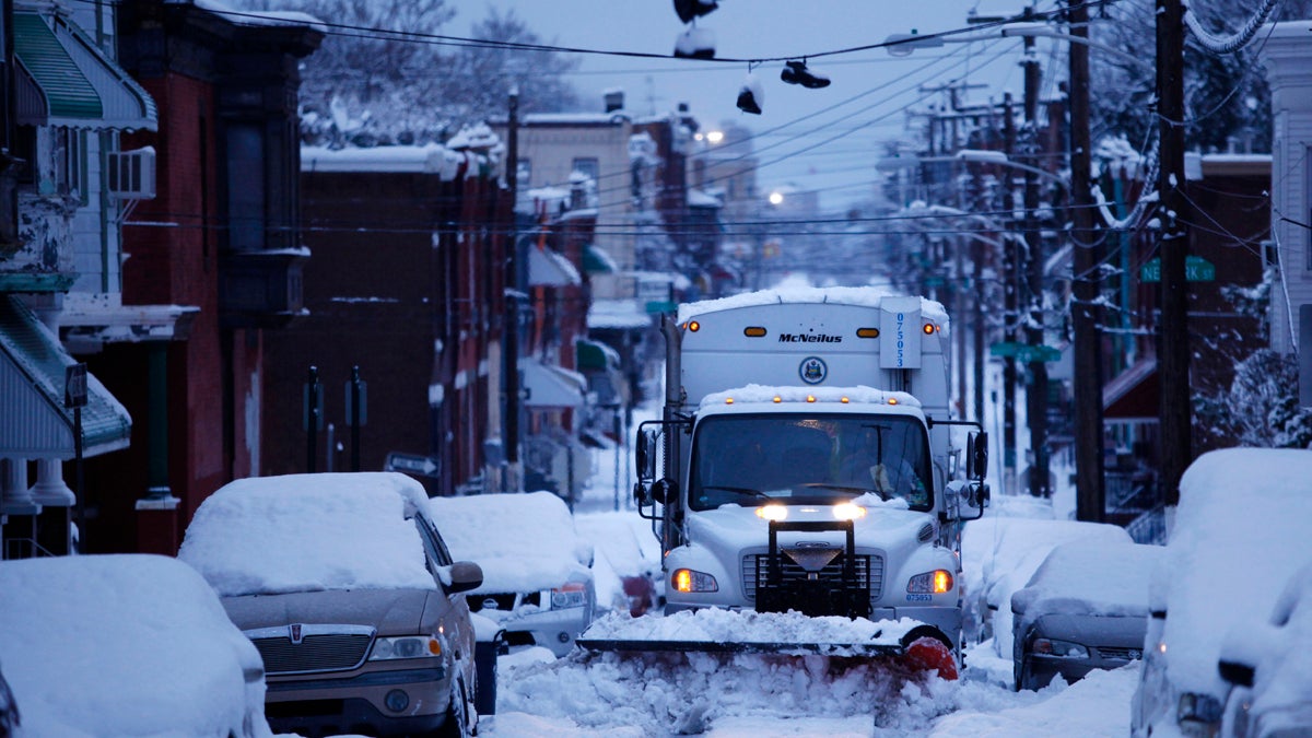  A city truck plows snow from the street during a winter storm in Philadelphia. (AP Photo/Matt Rourke) 