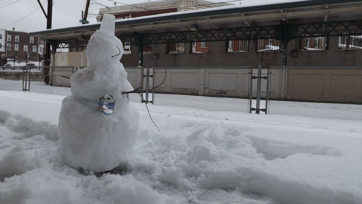  Here's one of our favorite shots from last year. This snowman is holding a beer and waiting for the train at Wissahickon station. (Courtesy of Vilnis Valentine Chakars) 