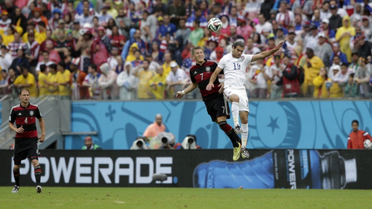 Bastian Schweinsteiger (7) of Germany and Graham Zusi (19) of USA during the group G World Cup soccer match between the USA and Germany at the Arena Pernambuco in Recife, Brazil, Thursday, June 26, 2014. (AP Photo/Matthias Schrader) 