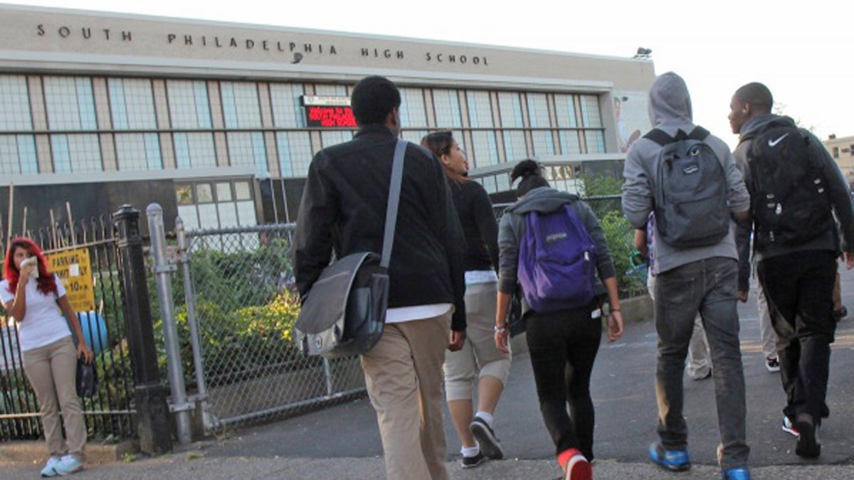 Students arrive for the first day at South Philadelphia High School. School officials are trying to ease concerns that receiving students from the now-closed Bok Technical High School will cause tension in the school. (Kimberly Paynter/WHYY) 