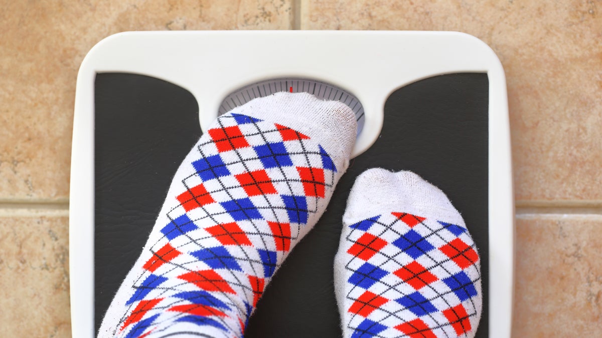  (<a href=“http://www.shutterstock.com/pic-258362069/stock-photo-woman-s-feet-on-bathroom-scale-diet-concept.html?src=zMLrpY4xAqAALCYuyLfeng-1-8”>Photo</a> via ShutterStock) 
