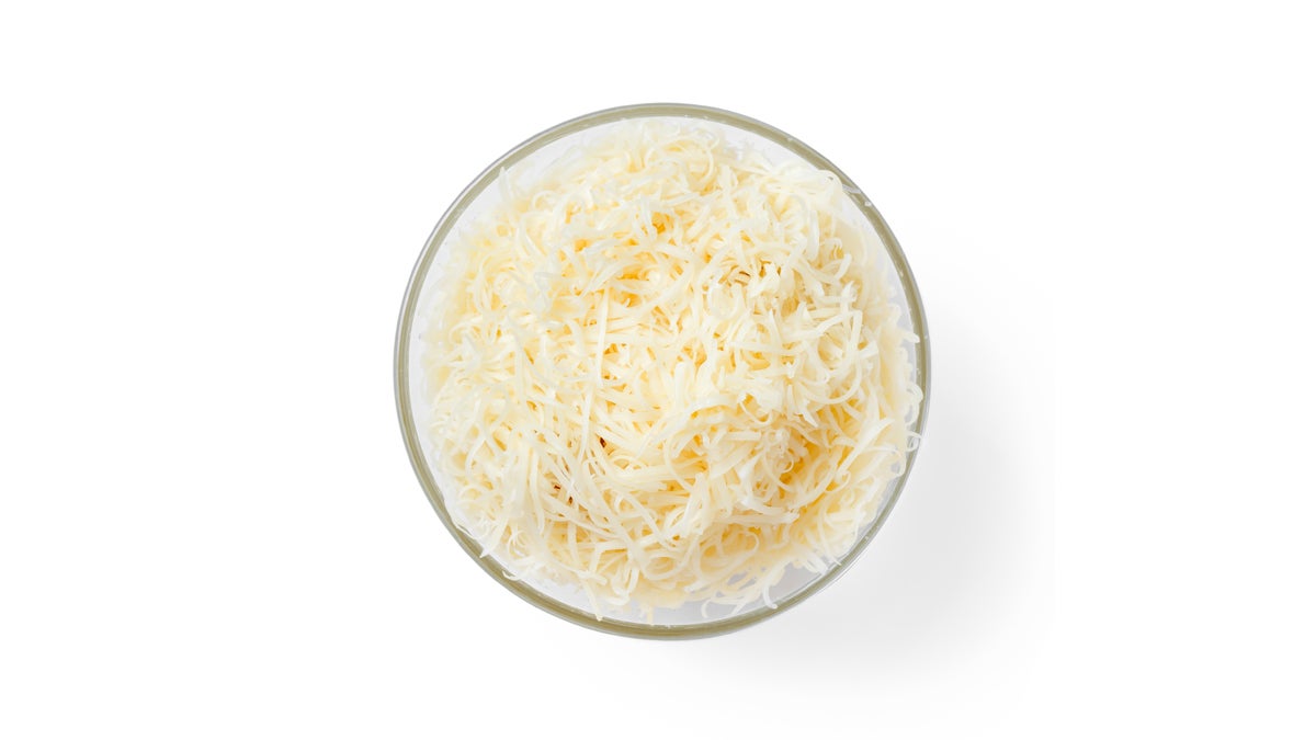  (<a href=“http://www.shutterstock.com/pic-151347635/stock-photo-bowl-with-grated-cheese-on-a-white-background-top-view.html?src=YONMUgU6PHQO0d5DDDU-Ww-1-14”>Photo</a> via ShutterStock) 