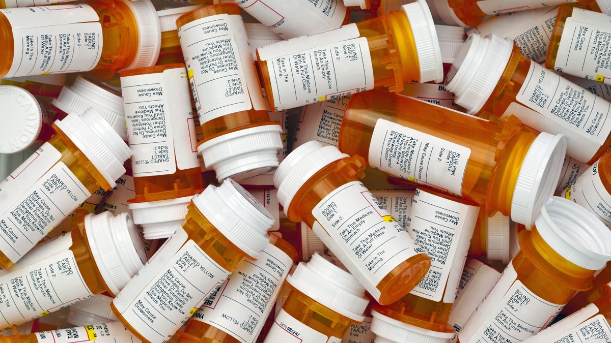 Prescription drug bottles are shown.