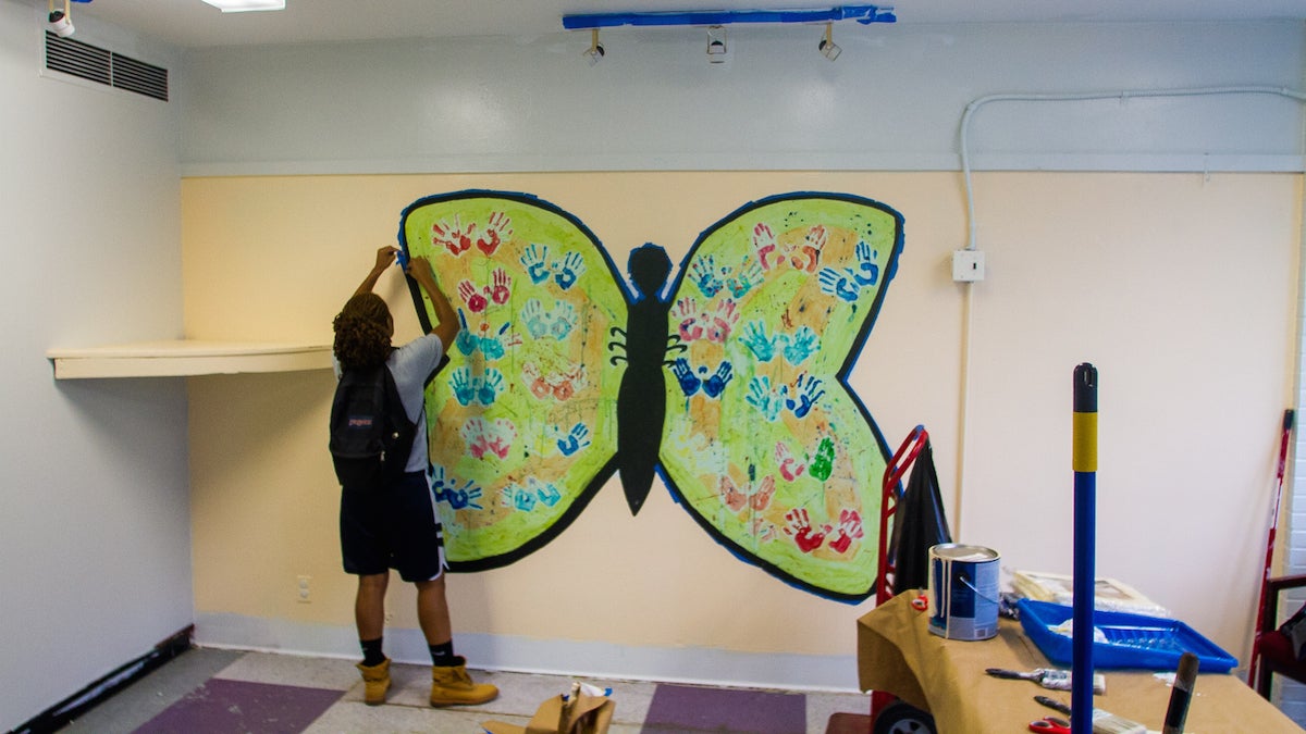 A room was being repainted and outfitted with new lighting at Stenton Manor Family Homeless Shelter. (Brad Larrison/for NewsWorks)
