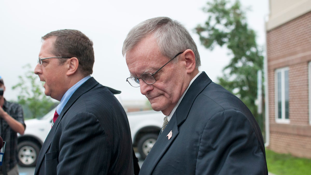  Former Harrisburg Mayor Steve Reed (right) and attorney, Henry Hockeimer in front of a suburban courthouse after being arrested on corruption charges, Tuesday, July 14, 2015. (Diana Robinson/WITF) 