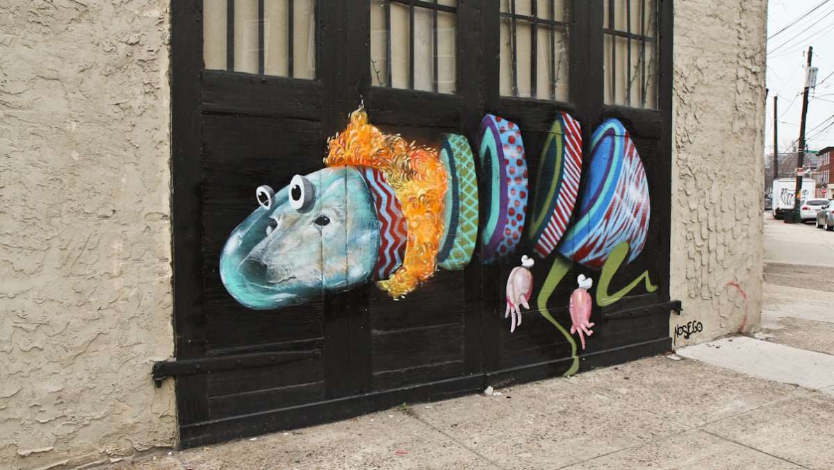  Philadelphia mural artist Yis 'Nosego' Goodwin created this creature on the 1800 block of Hancock Street in June of 2013. (Kimberly Paynter/WHYY) 