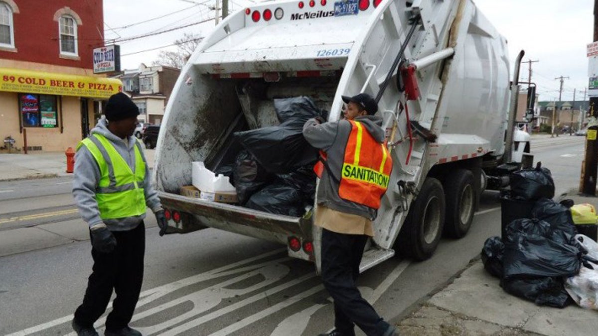 Philadelphia sanitation workers on their route. (Image courtesy of Philadelphia Streets Department)