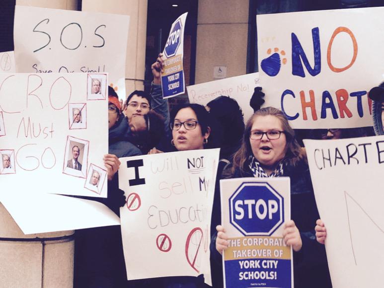  High school students in the city of York protest the potential state takeover and forced charterization of their school district. (Emily Previti/WITF) 