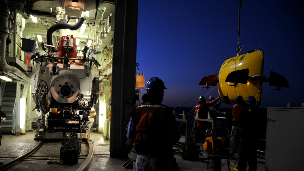 The Alvin submersible and Sentry AUV on board the RV Atlantis in December 2010. (Photo courtesy of Erik Cordes)
