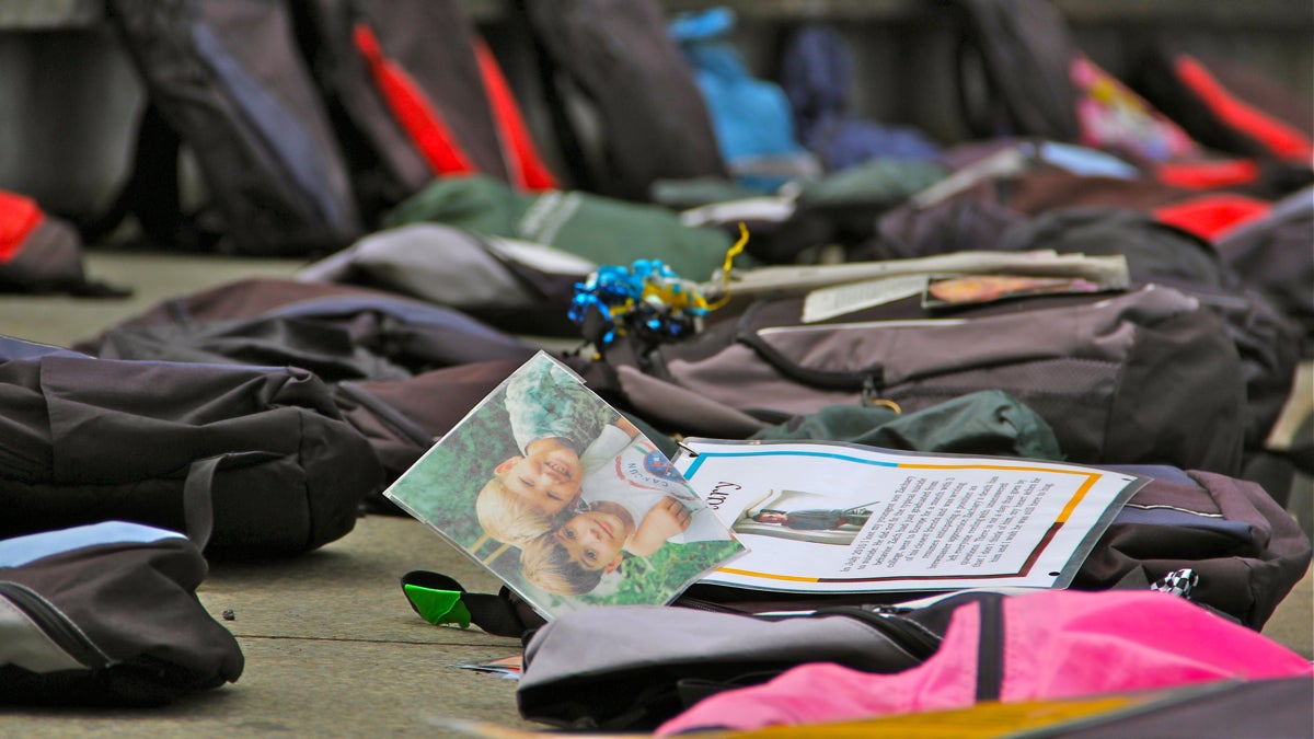  The Send Suicide Packing exhibit included more than 1,000 backpacks decorated with photographs, personal possessions, and memorial messages of suicide victims and their families. (NewsWorks file photo) 