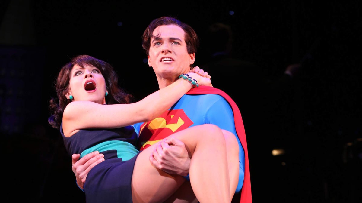  Actors Jenny Powers and Edward Watts are shown as Lois Lane and Superman in a 2013 stage production of 