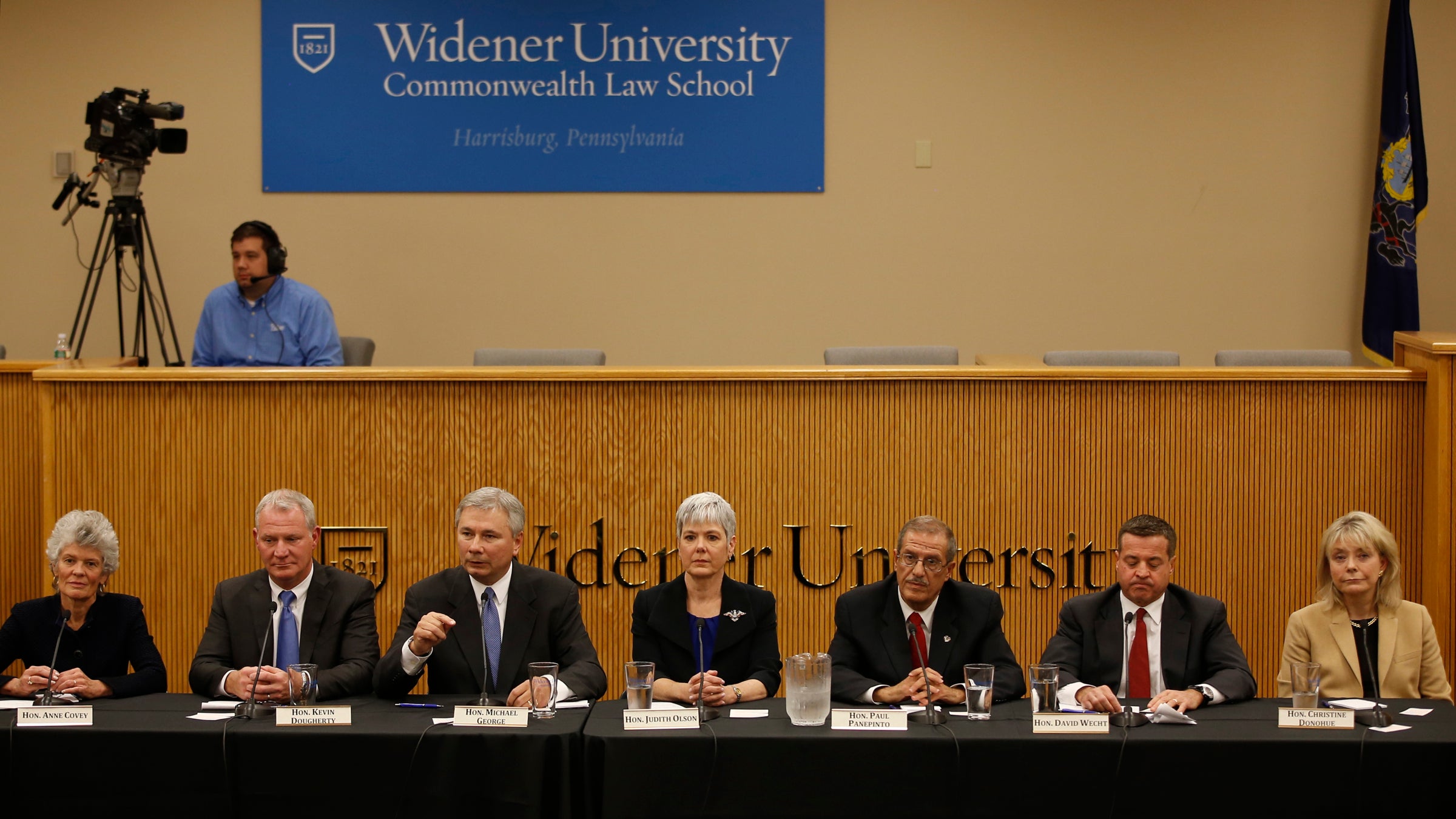Supreme Court Pennsylvania State Superior Court judge Christine Donohue, from right, state Superior Court Judge David Wecht, Philadelphia Judge Paul Panepinto, state Superior Court Judge Judith Olson, Adams County, Pa., Judge Michael George, Philadelphia Judge Kevin Dougherty and state Commonwealth Court Judge Anne Covey participate in a Pennsylvania Supreme Court debate, Wednesday, Oct. 14, 2015, at the Widener University Commonwealth Law School in Harrisburg, Pa. On Nov. 3, voters will fill three vacancies on the seven-member state Supreme Court. (AP Photo/Matt Slocum)